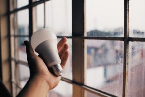 swo contracting energy efficient lightbulb near window window repair blog