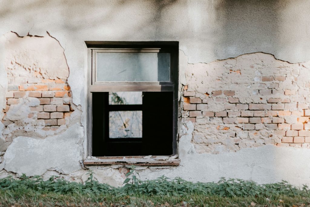 (Signs It's Time to Replace Your Windows in Your Home)-(Old open window)-(To show its letting in a draft)